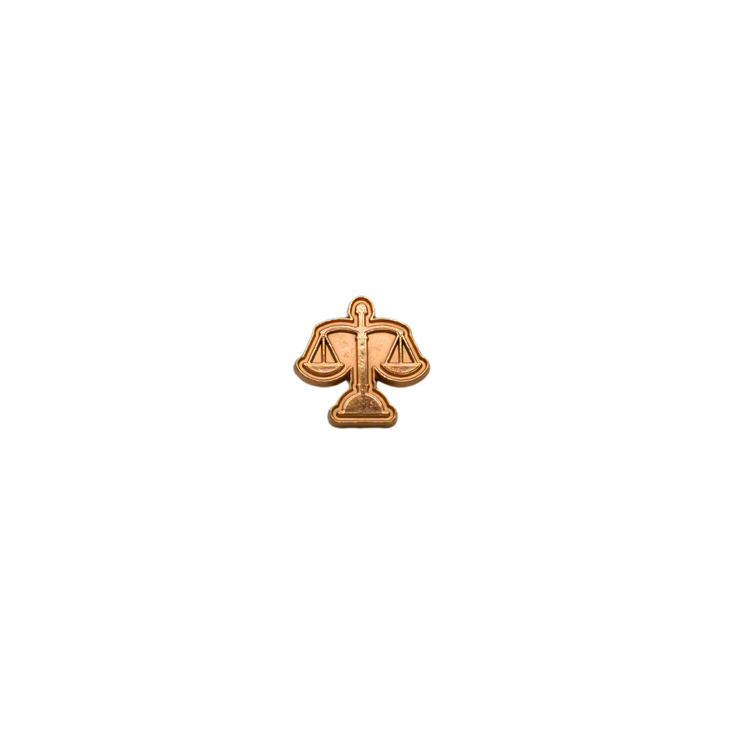 GOLDEN JUSTICE BROOCH