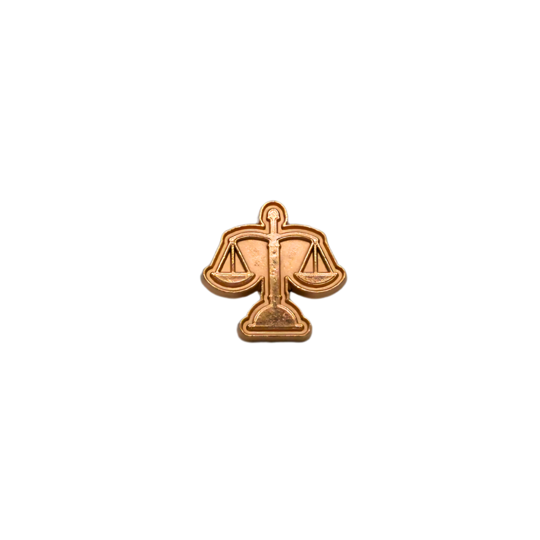 GOLDEN JUSTICE BROOCH